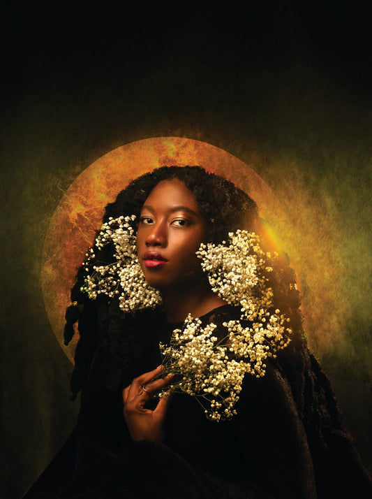 Woman holding flowers with a warm, glowing circular light in the background